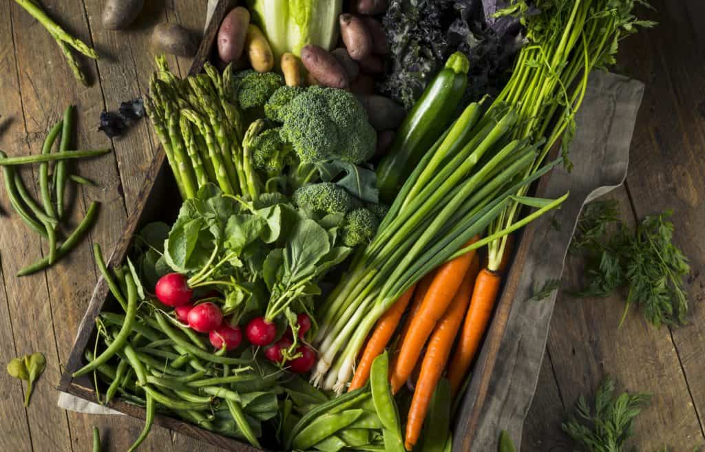 box of seasonal vegetables for a farmer's market