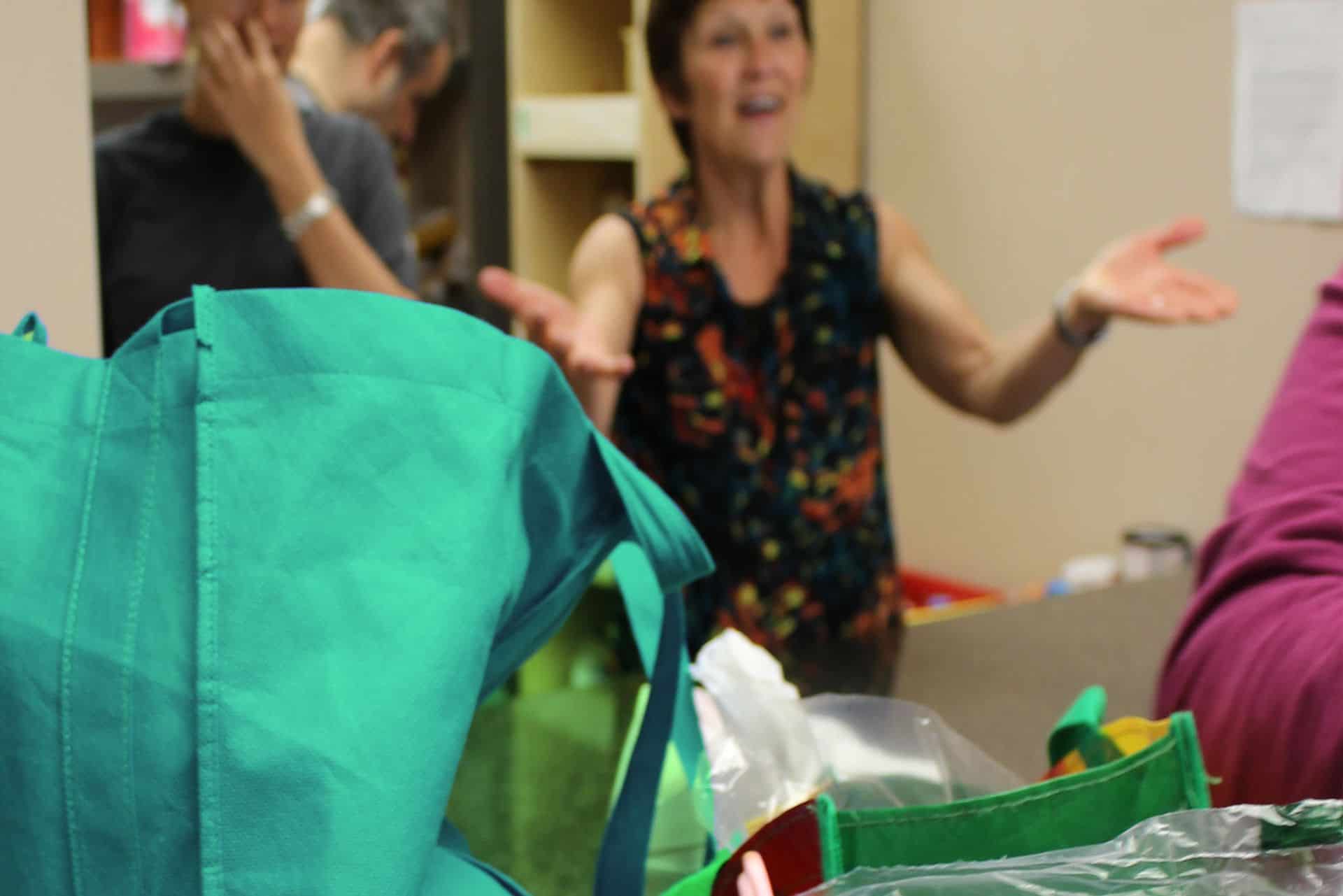 grocery bags on counter at the food bank