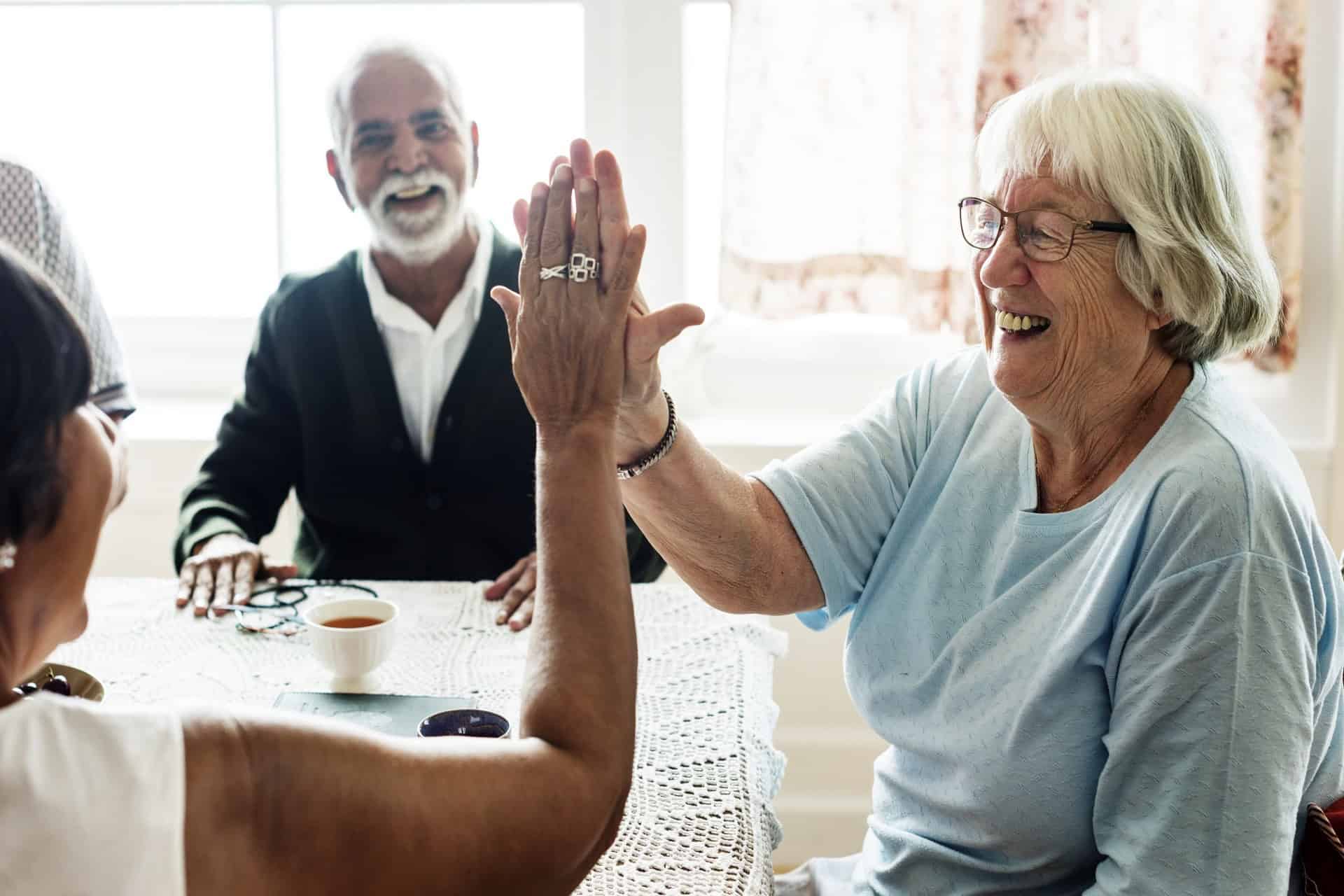 Seniors enjoying coffee and tea with friends