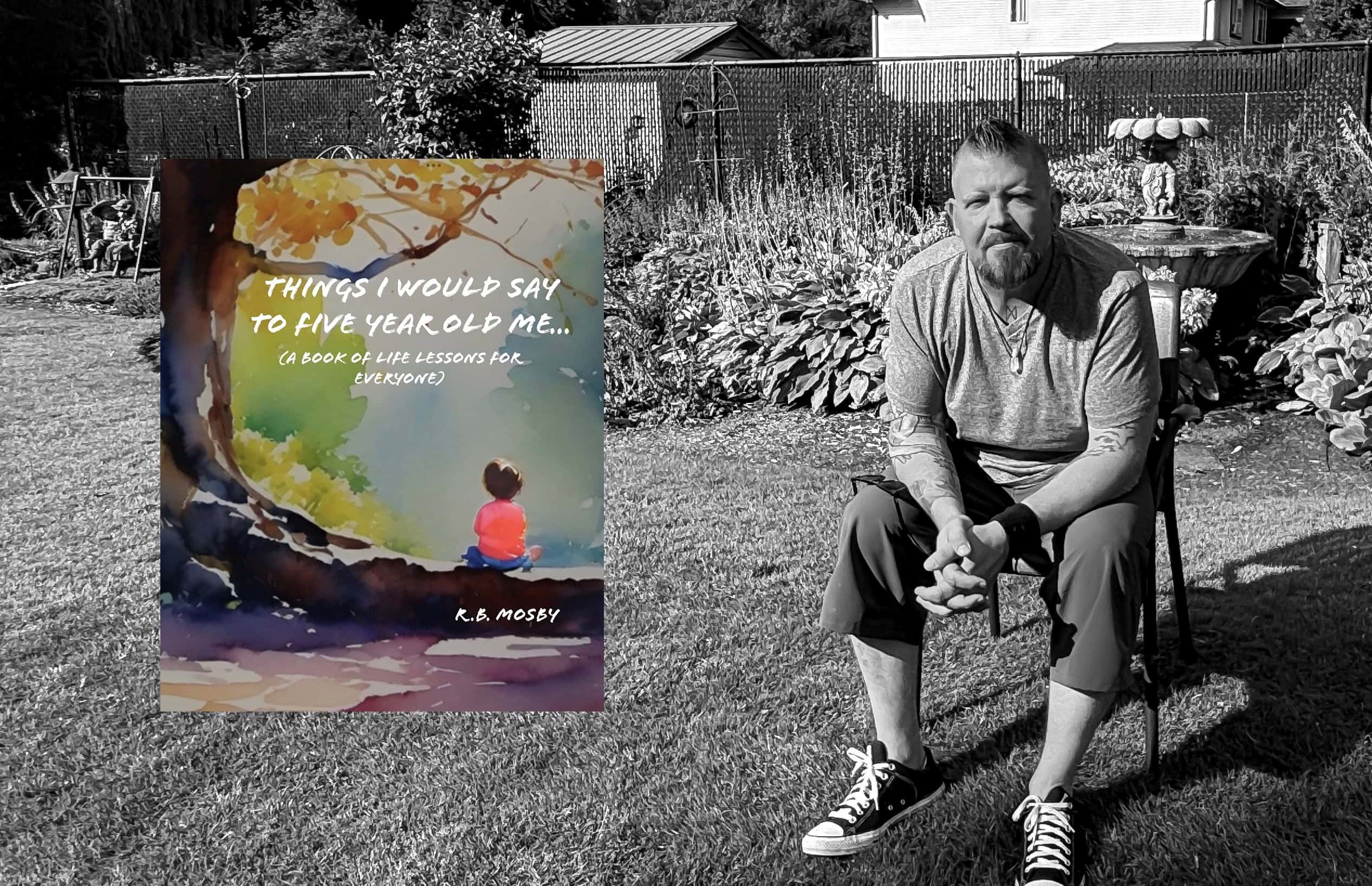 Black and white headshot of man wearing glasses