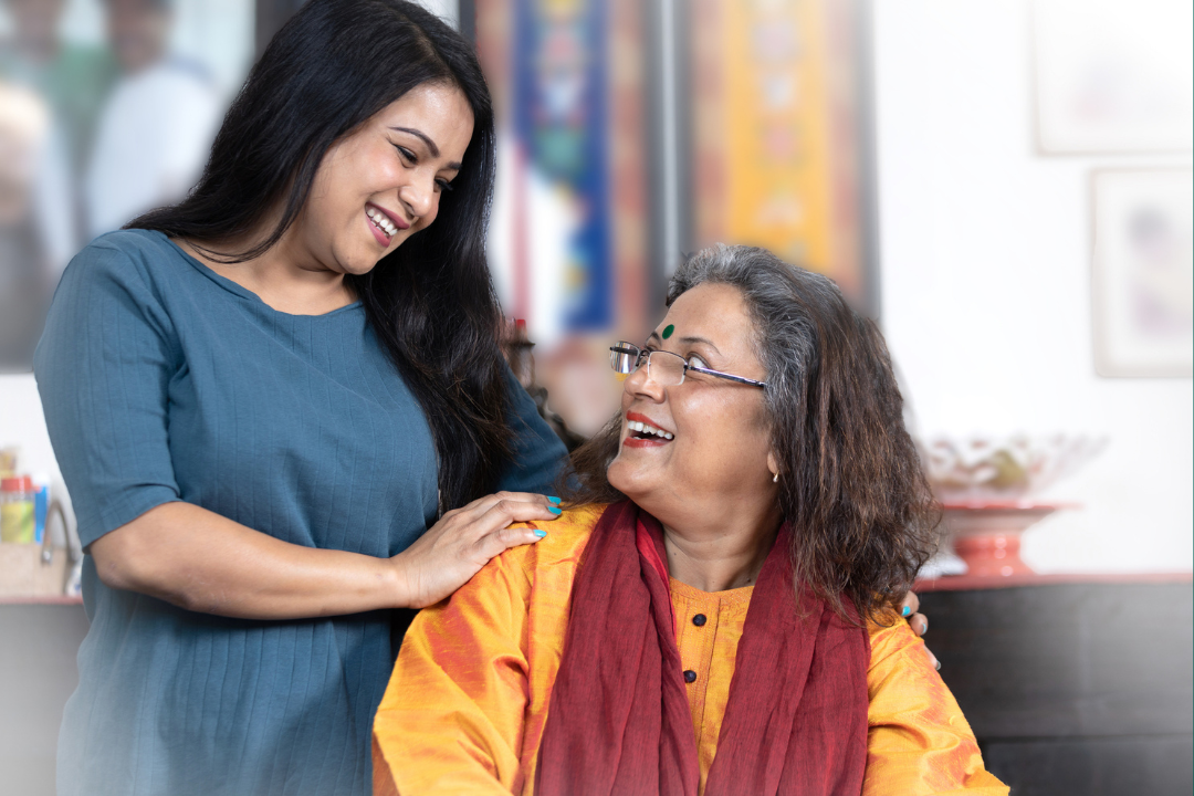 Indian mother and daughter smiling